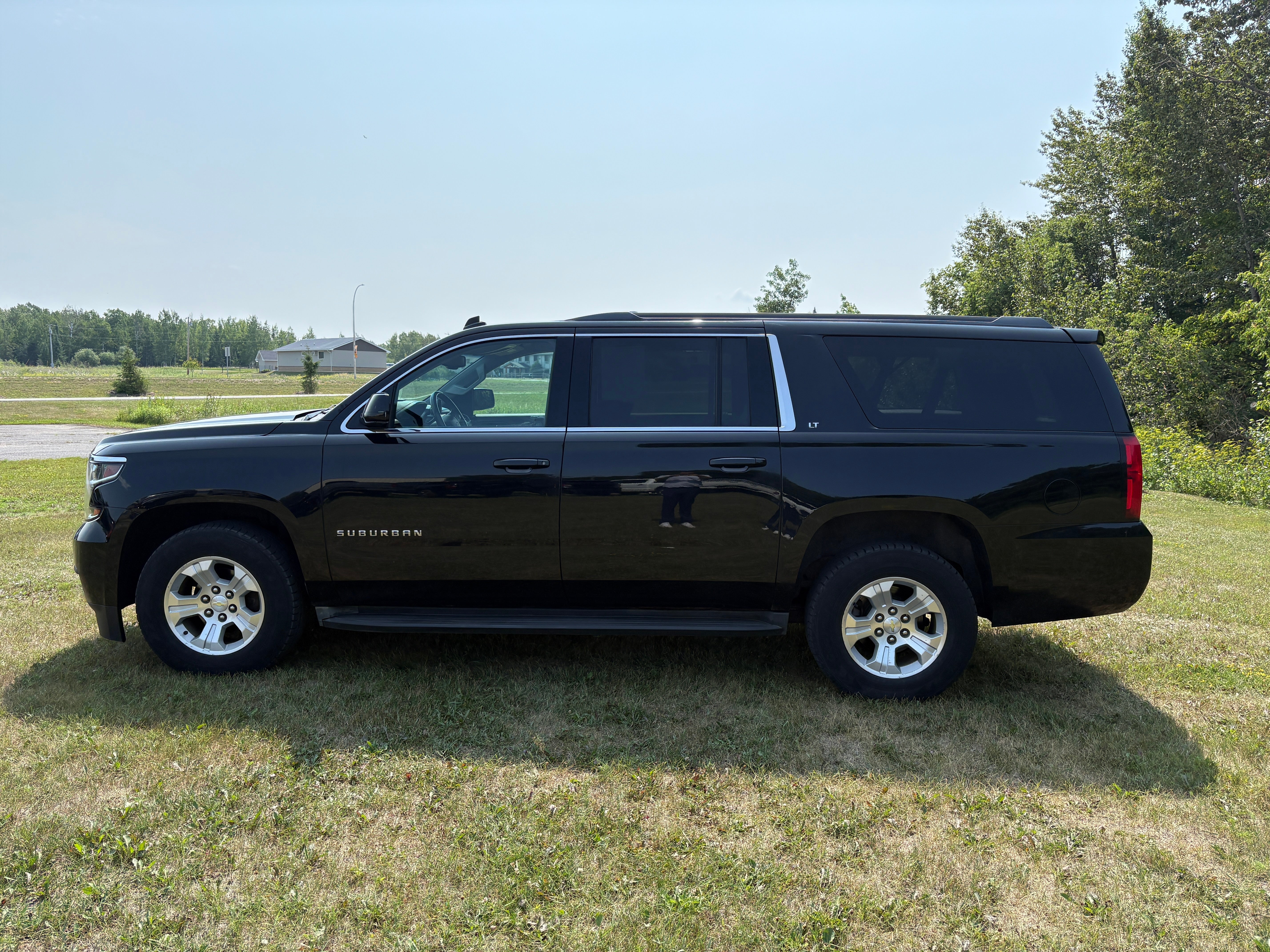 Used 2015 Chevrolet Suburban LT with VIN 1GNSKJKC5FR294684 for sale in International Falls, Minnesota