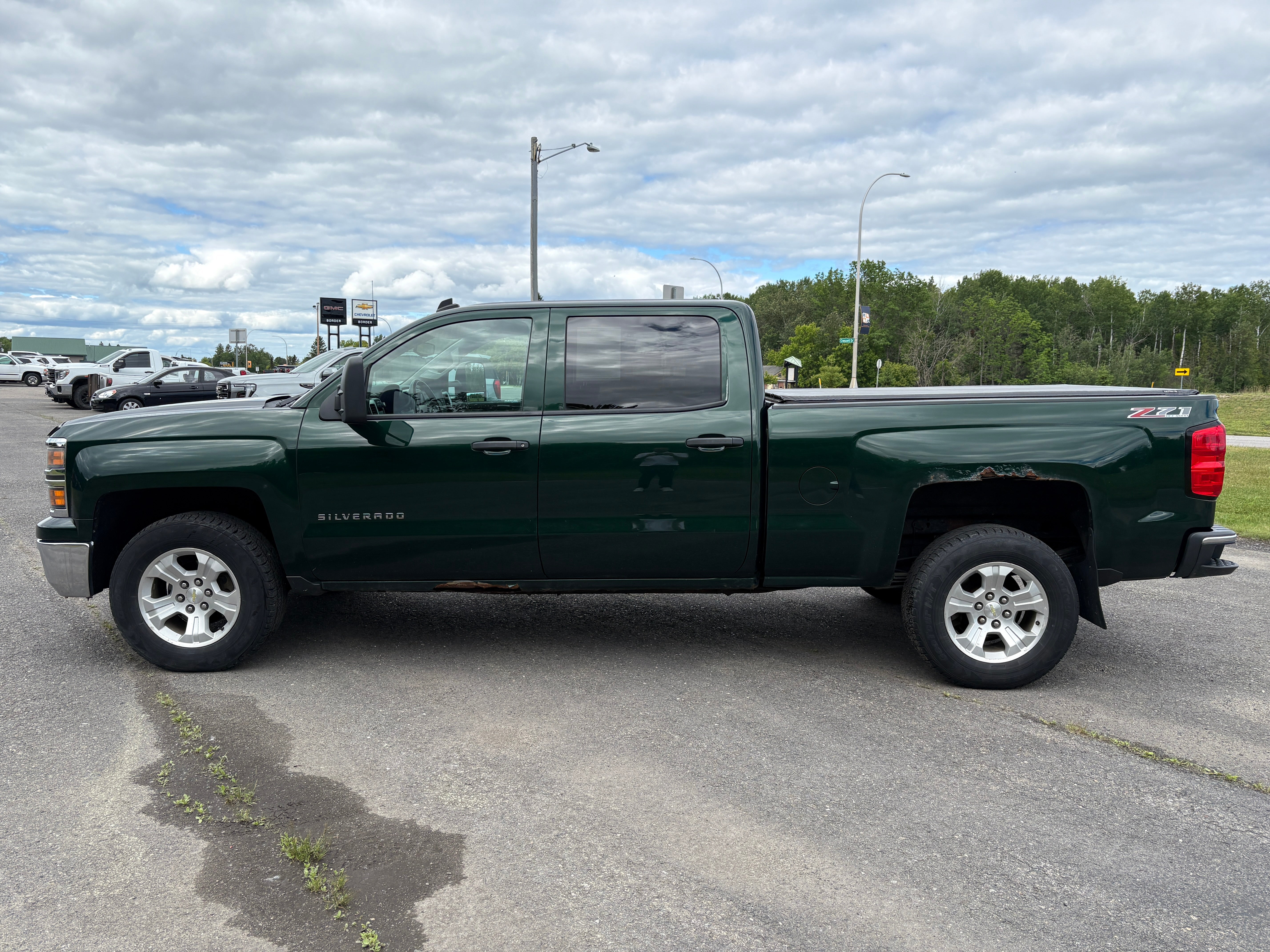 Used 2014 Chevrolet Silverado 1500 LT with VIN 3GCUKREC7EG429089 for sale in International Falls, MN